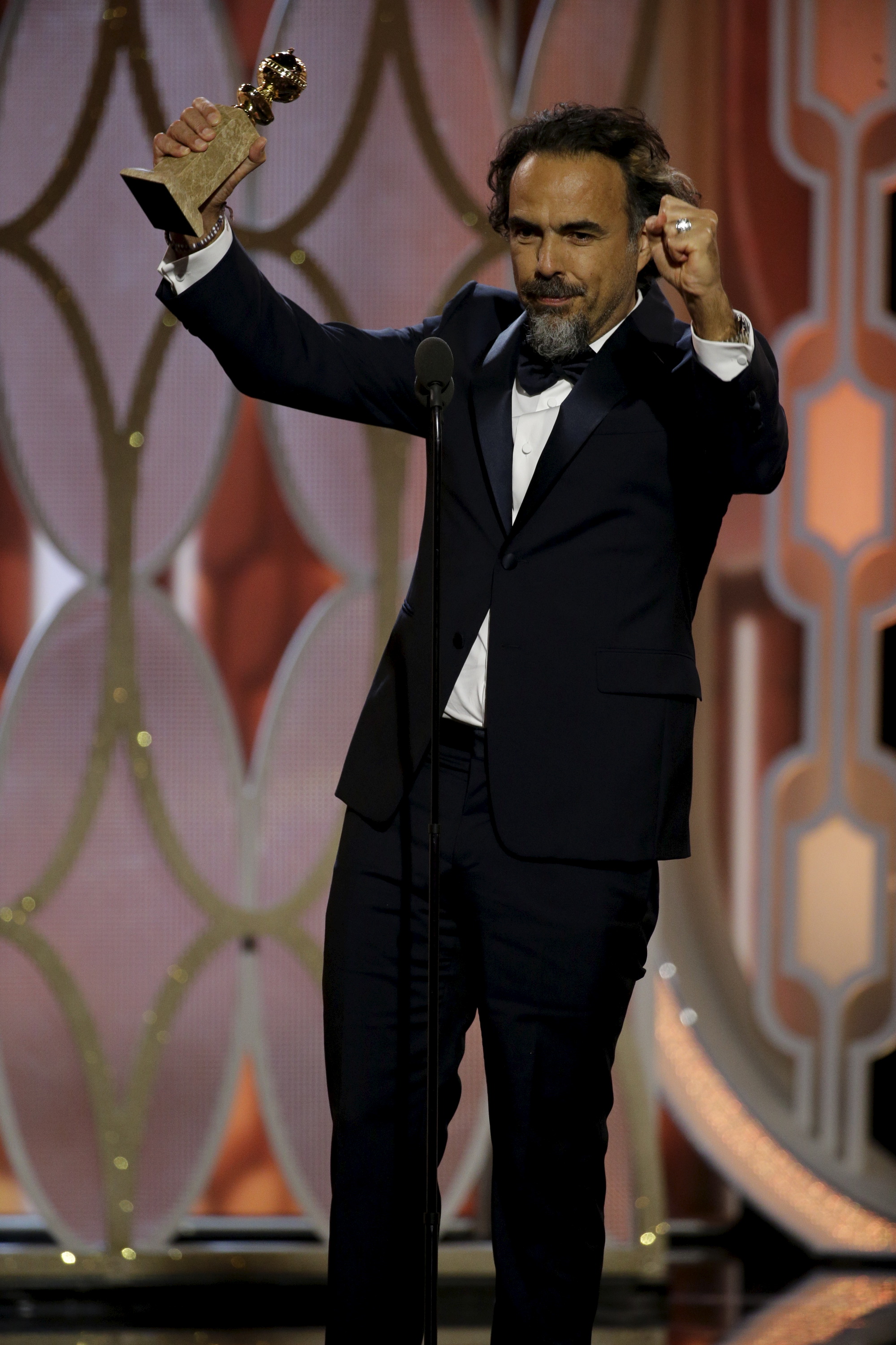Alejandro G. Inarritu reacts after winning the Best Director - Motion Picture for "The Revenant", at the 73rd Golden Globe Awards in Beverly Hills, California January 10, 2016. REUTERS/Paul Drinkwater/NBC Universal/Handout For editorial use only. Additional clearance required for commercial or promotional use. Contact your local office for assistance. Any commercial or promotional use of NBCUniversal content requires NBCUniversal's prior written consent. No book publishing without prior approval. TPX IMAGES OF THE DAY - RTX21S9P
