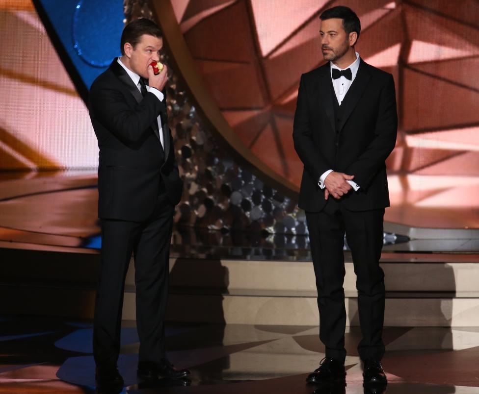 Actor Damon jokes around with show host Kimmel at the 68th Primetime Emmy Awards in Los Angeles